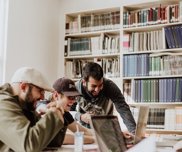 Happy students celebrating graduation